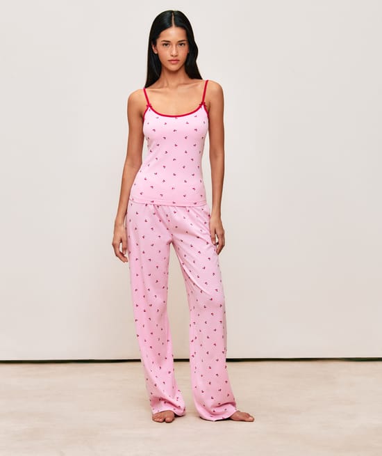 Tank top with adjustable straps featuring a cherry pattern;