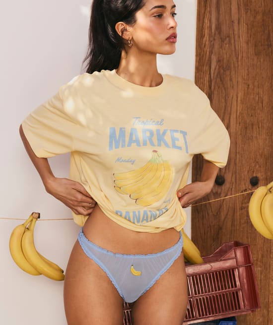 Mesh thong with banana embroidery;