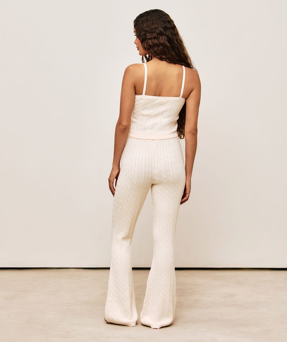 Pantalon flare en maille avec d&eacute;tail floral;