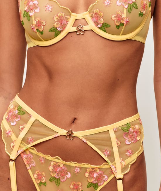 Tulle garter belt with floral embroidery;