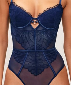 Mesh body string with floral embroidery;