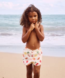 Kids' swimsuit shorts with fruity and floral pattern;