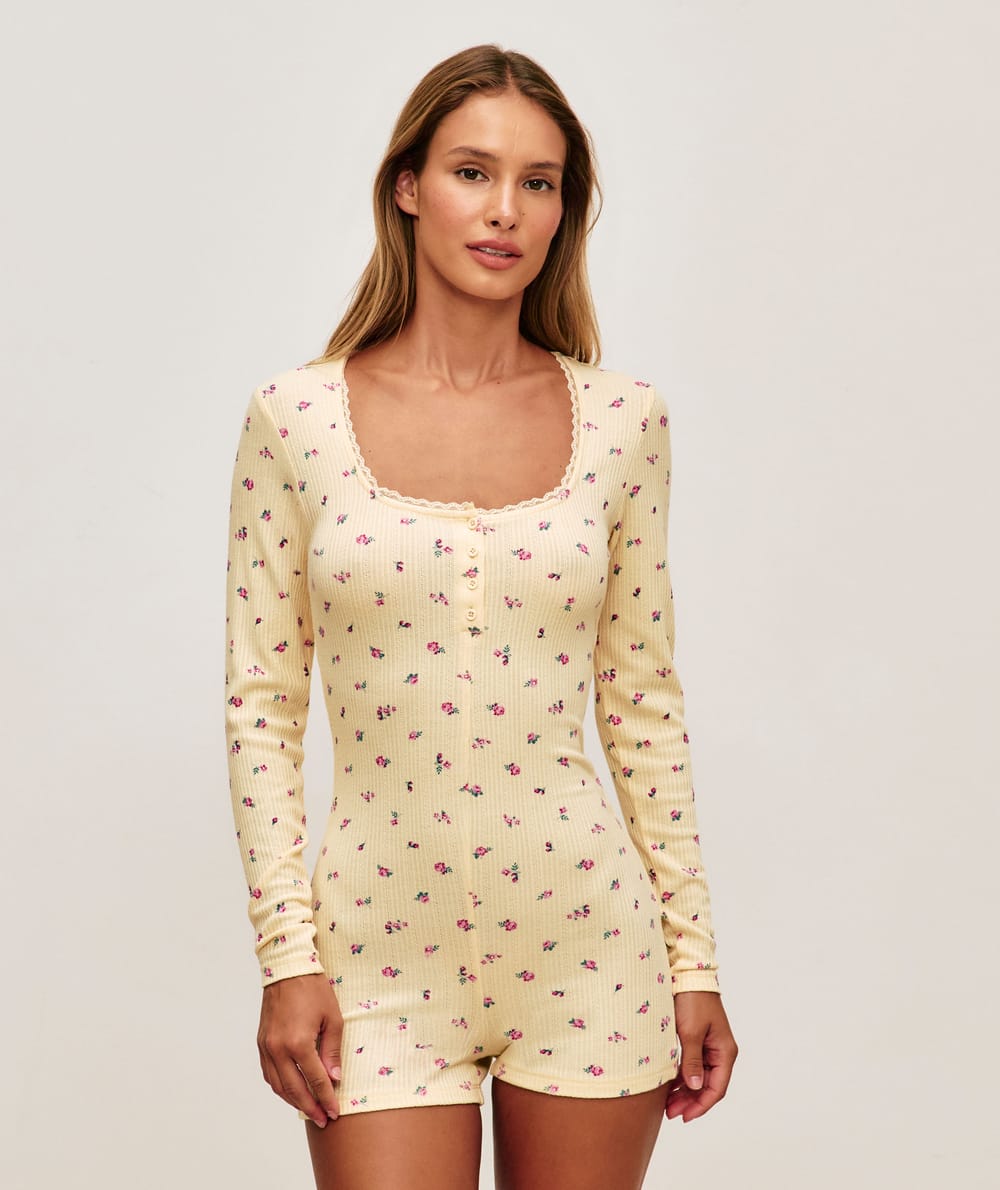 Floral knitted playsuit;