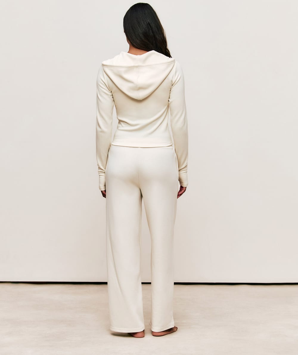 Trousers with Self Love Club embroidery;