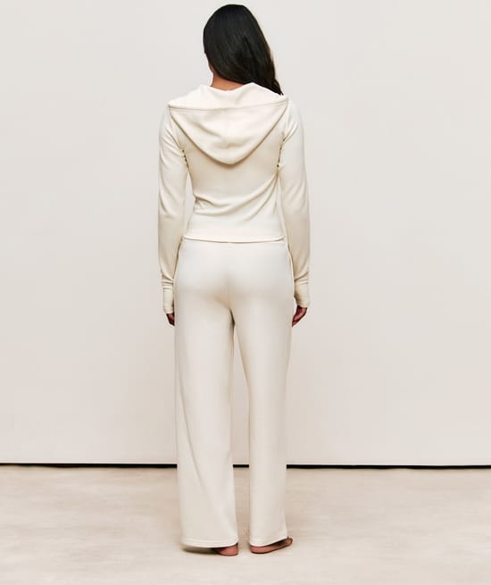 Trousers with Self Love Club embroidery;