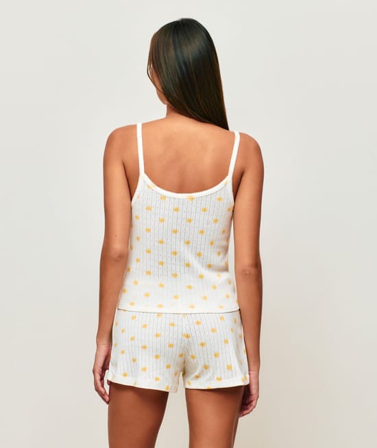 Fine strap tank top in printed lace suns;