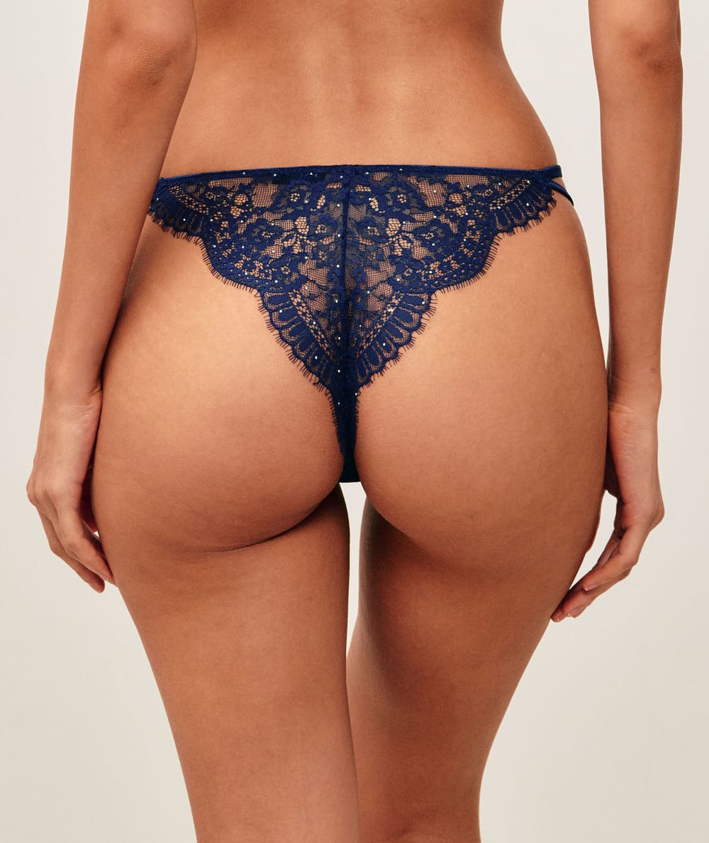 Lace thong with silver rhinestones;
