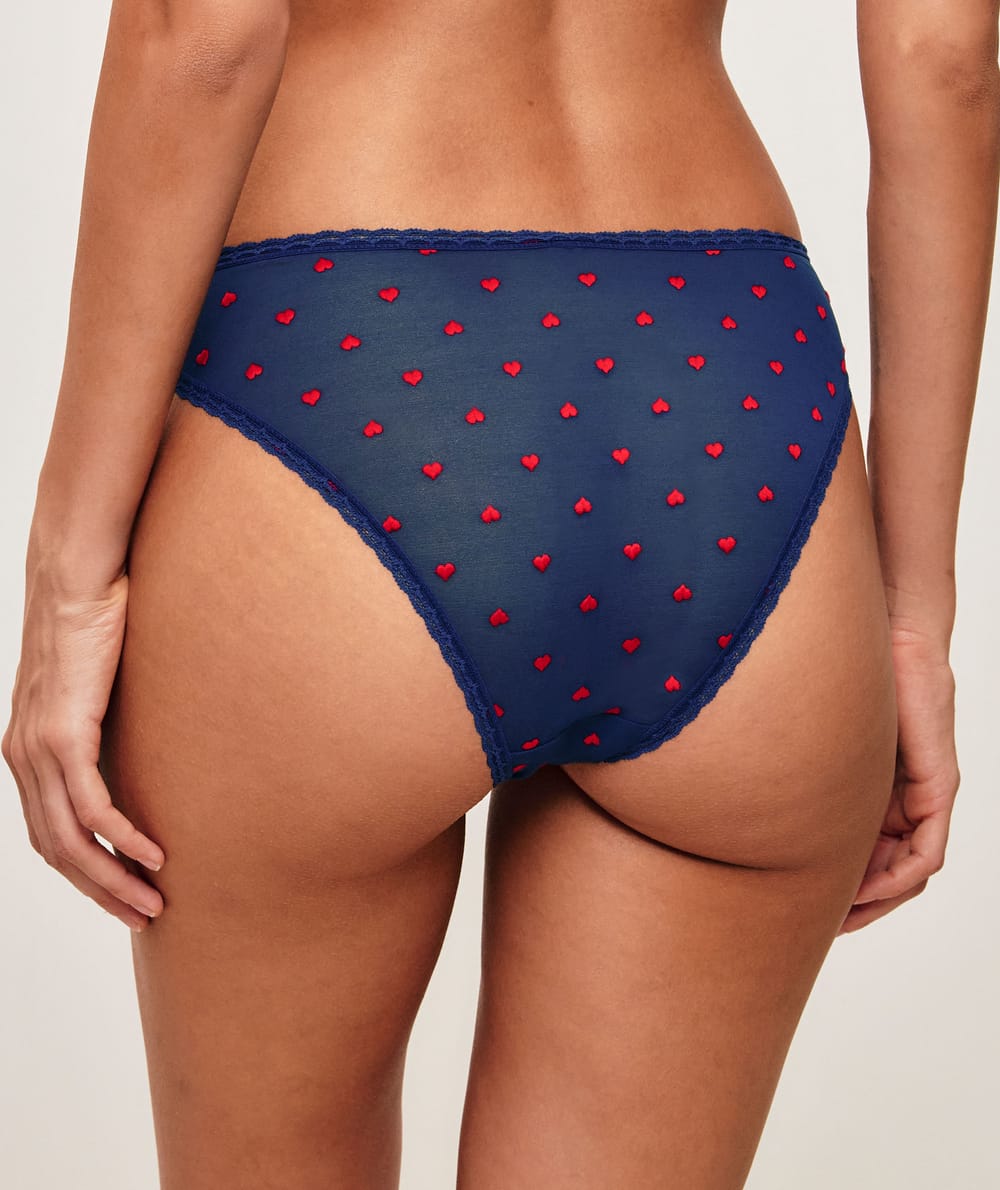 Mesh panties with embroidered hearts;