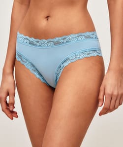 Cheeky in cotton and lace;