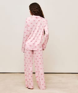 Striped shirt and pants set with tiny bows;
