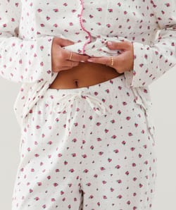 Ribbed jersey trousers with floral pattern;