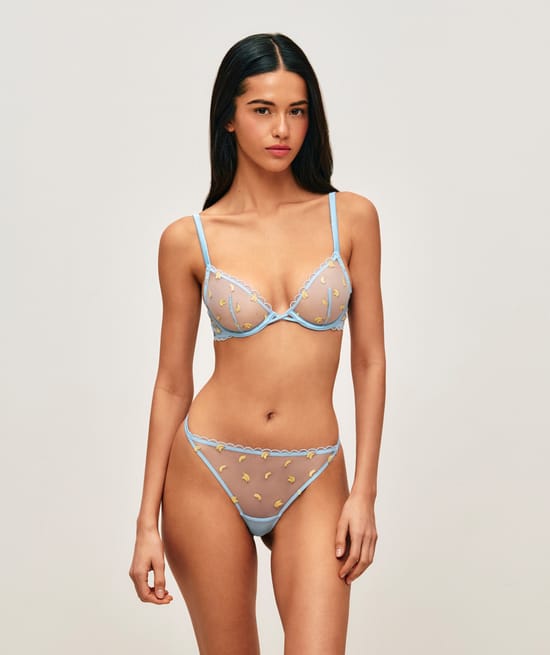 Mesh string with embroidered bananas;