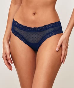 Cheeky in mesh and lace with polka dot embroidery;