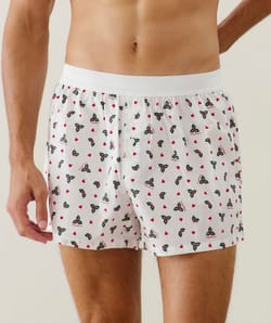 Cotton boxer shorts with holly and heart pattern;