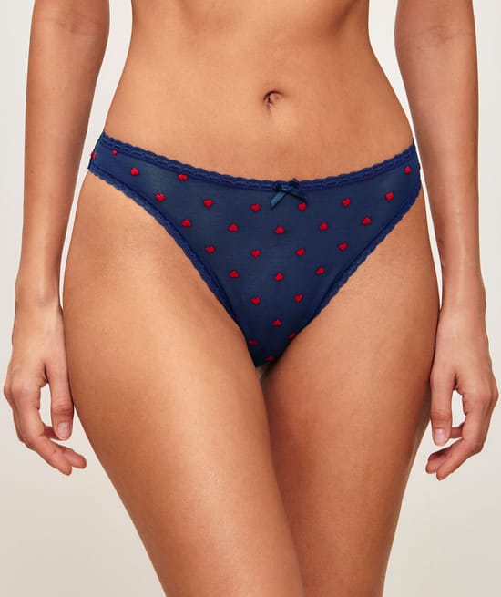 Mesh panties with embroidered hearts;
