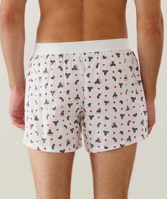 Cotton boxer shorts with holly and heart pattern;