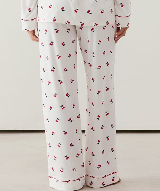 Ribbed jersey trousers with cherry pattern;