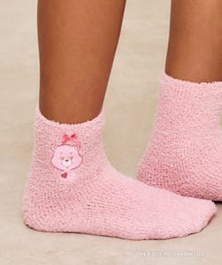 Fluffy knit socks with Care Bears embroidery;