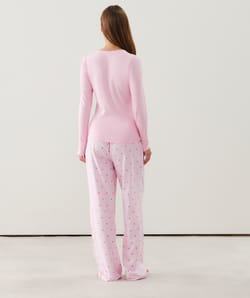 Flannel trousers with stripes and heart patterns;