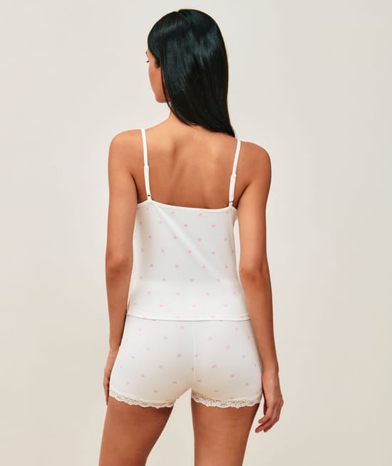 Jersey pajama set with heart patterns and lace;