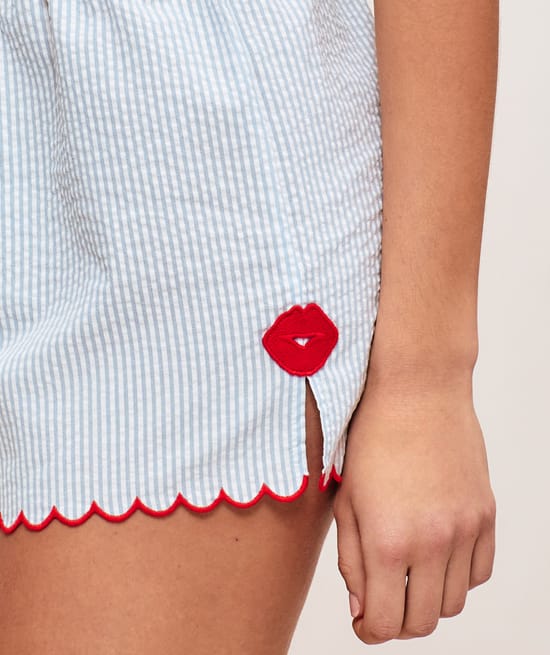 Cotton shorts with striped mouth pattern;