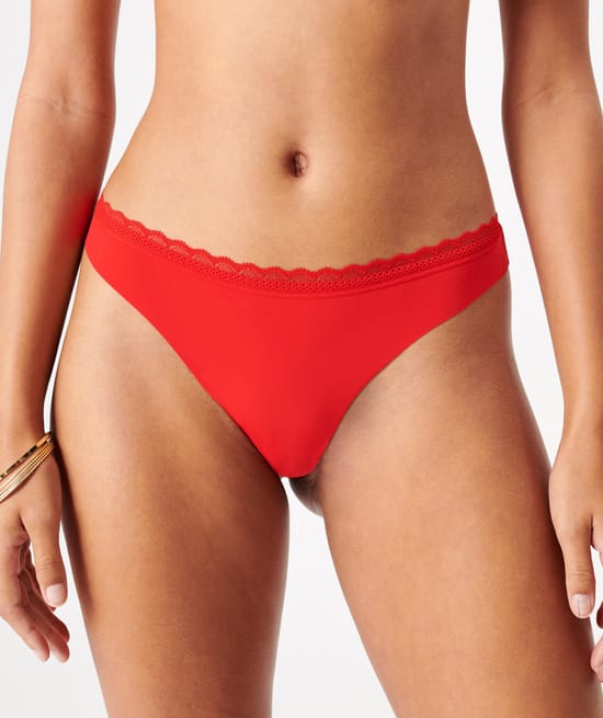 Tanga en microfibre et dentelle;