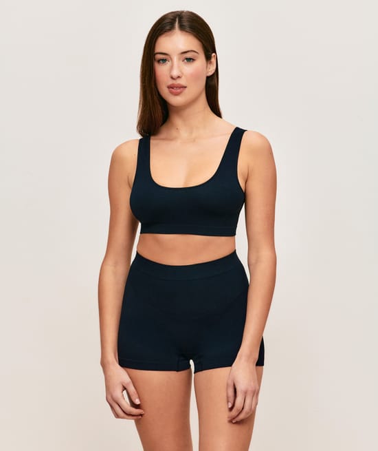 Seamless ribbed bralette in black;