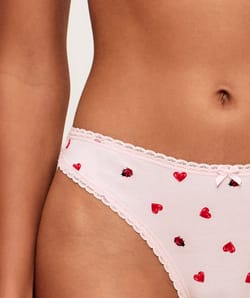 Cotton thong with heart and ladybug patterns;