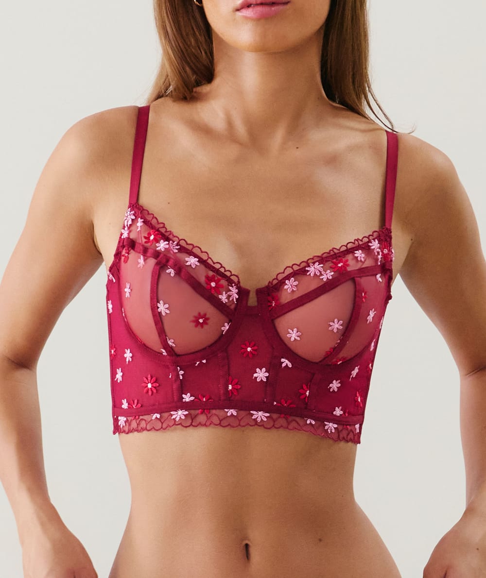 Balconette bustier with embroidered floral patterns;