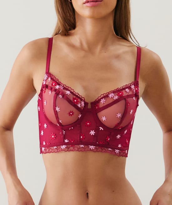 Balconette bustier with embroidered floral patterns;