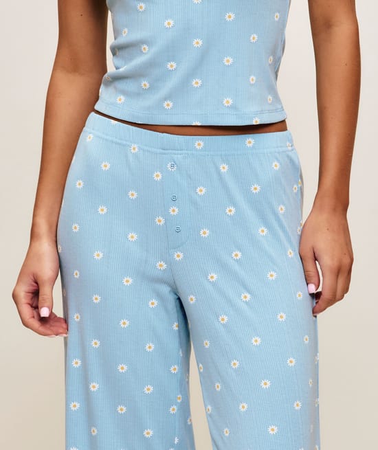 Sleeve pants in ribbed jersey with floral patterns;