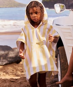 Kinderen poncho met zonnenpatroon;