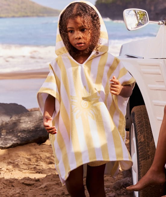 Kinderen poncho met zonnenpatroon;