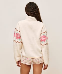 Floral patterned sherpa fleece jacket;
