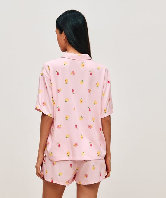 Shirt and shorts set with cocktail, flower, and lemon patterns;