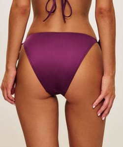 Swimsuit bottom with adjustable ties;