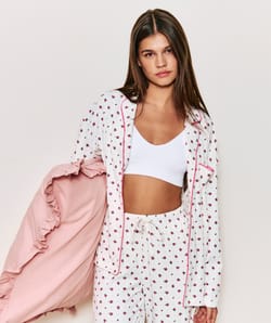 Ribbed jersey shirt with floral patterns;