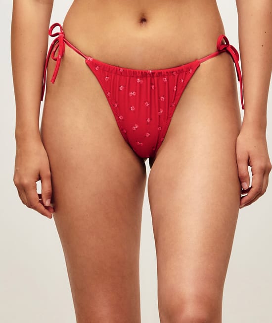 Bas de maillot de bain tanga avec motifs floraux;