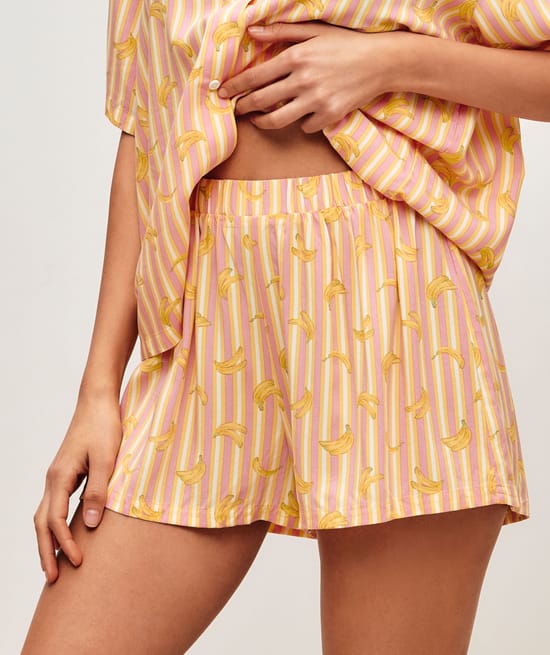 Striped shirt and shorts set with banana patterns;