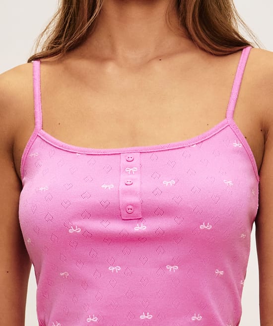 Cotton pointelle top with knot print;
