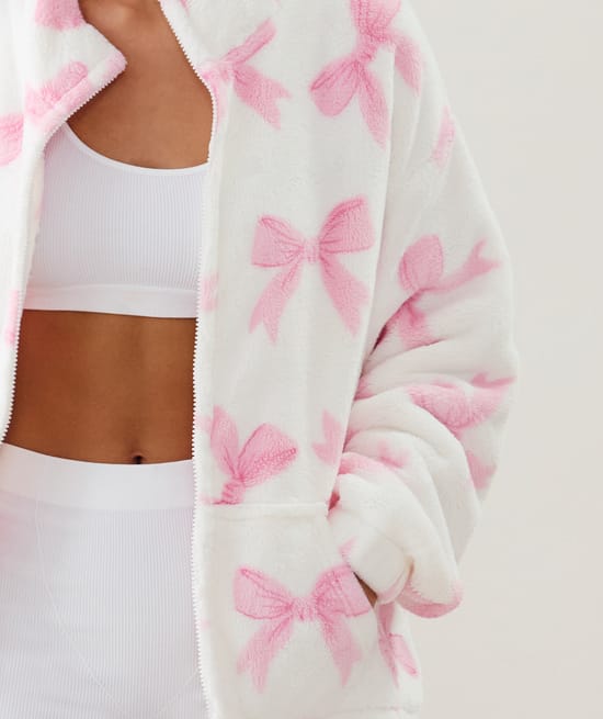 Fleece jacket with bow pattern;