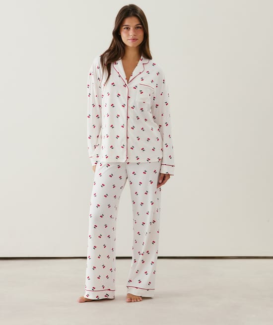 Ribbed jersey trousers with cherry pattern;