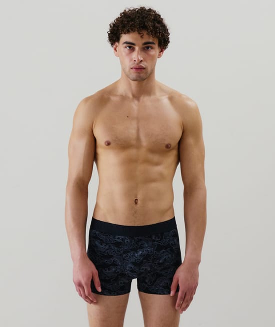 White patterned boxer shorts;