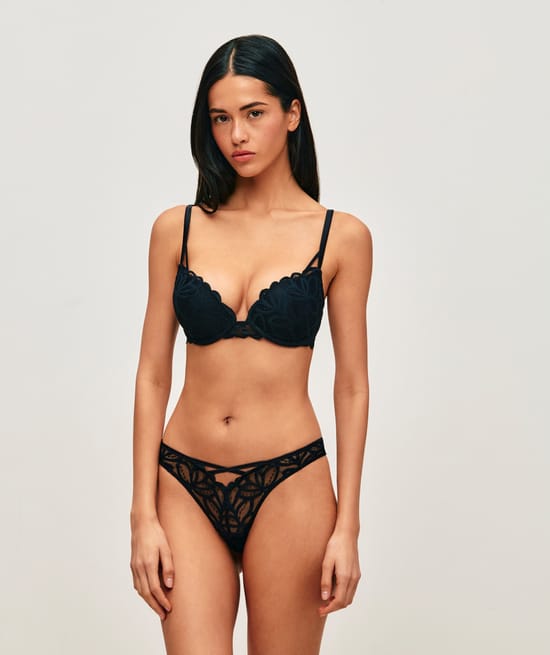 Mesh string with floral embroidery;