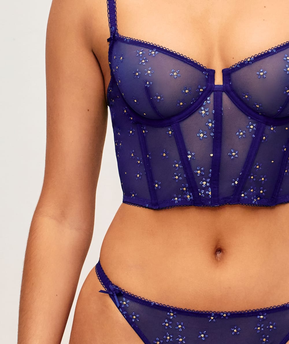 Tulle bustier with glitter flower patterns;