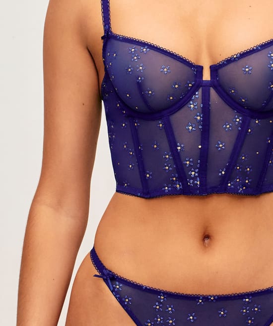 Tulle bustier with glitter flower patterns;