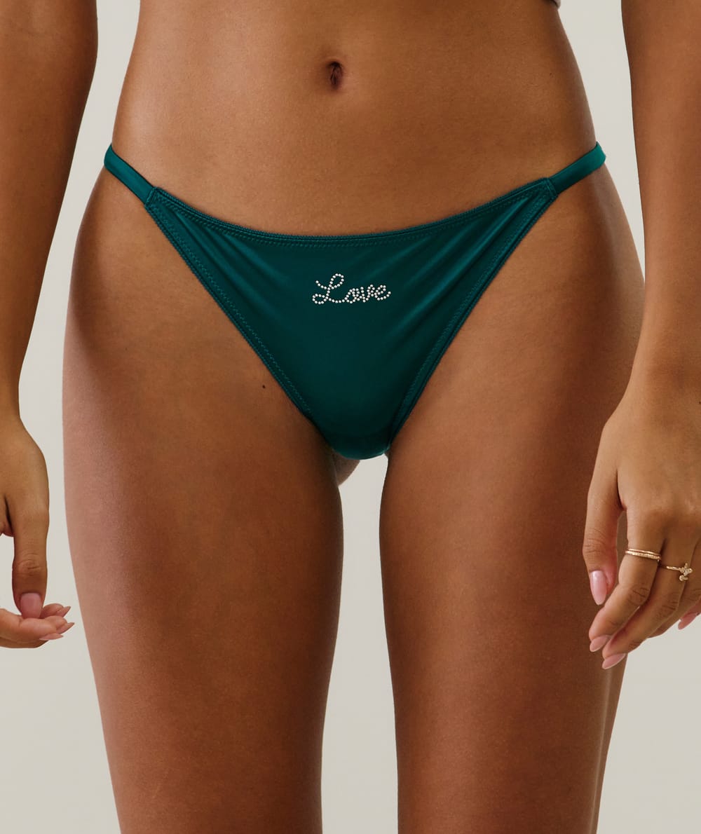 Tanga en microfibre et dentelle;