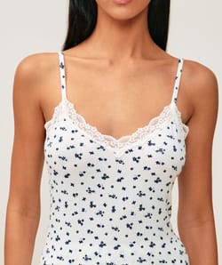 Tank top and jersey shorts with floral lace pattern;