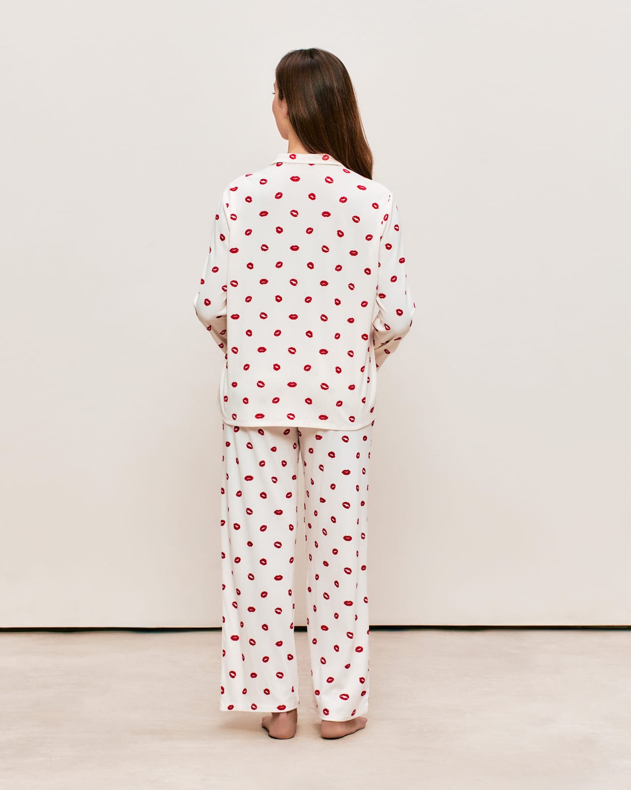 Ribbed jersey trousers with lip pattern;