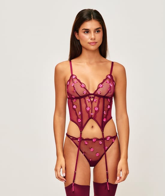 Mesh corset with embroidered flowers;